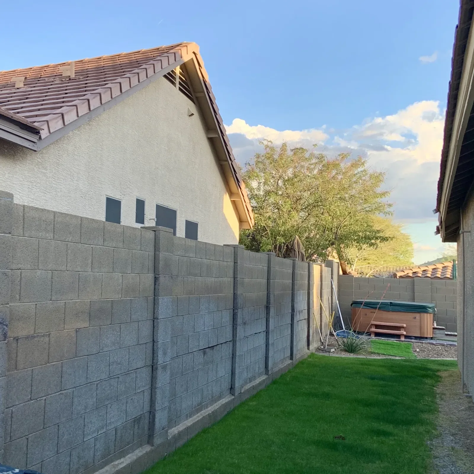 fence-company-phoenix-az-block-wall Fence company in Phoenix, Arizona — a new residential block wall fence around a desert landscaped home.