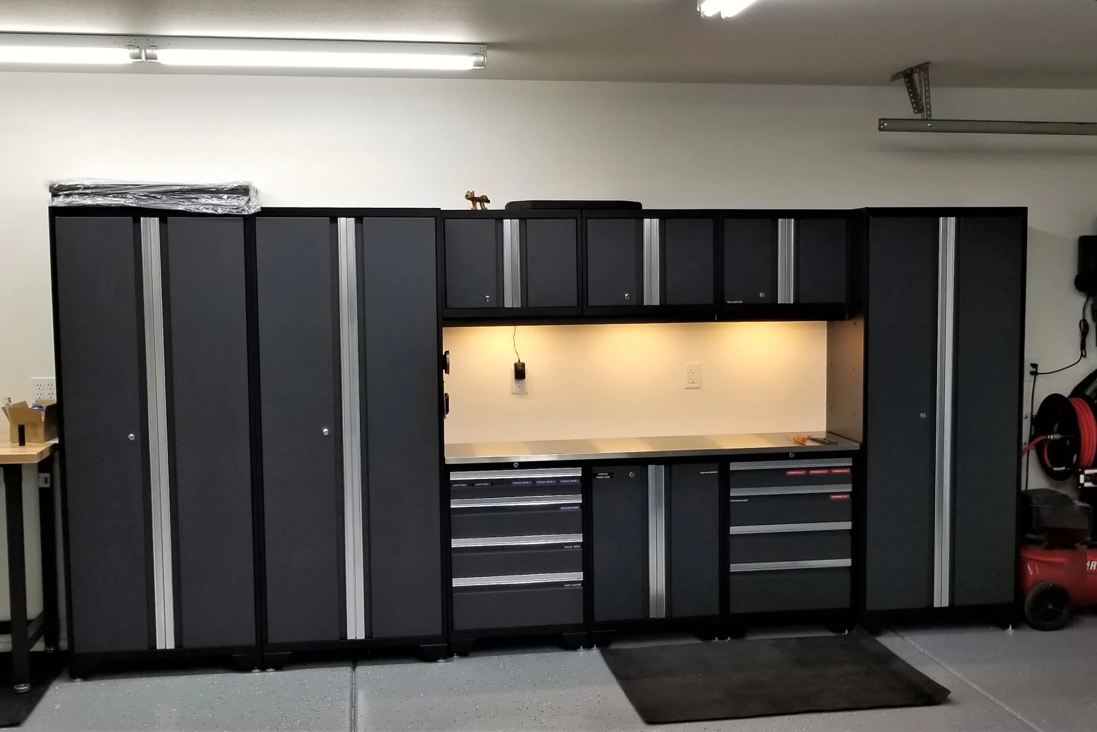 garage-shelving-phoenix-heat-resistant-steel-shelving A heavy-duty steel garage storage and shelving system installed in a Phoenix garage, built to withstand the region's extreme summer heat.