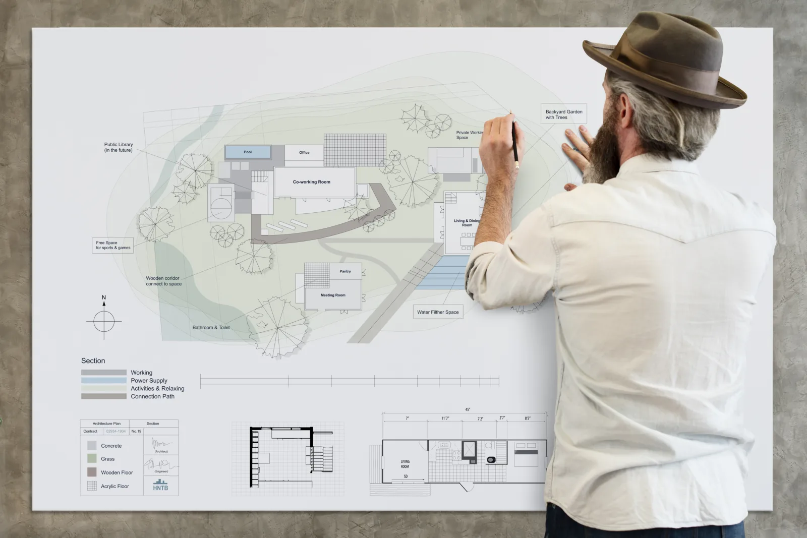 residential-landscape-architects-phoenix-designer-sketching-backyard-plan Residential landscape architects in Phoenix, Arizona — a landscape architect in a collared work shirt sketching a custom backyard design plan.
