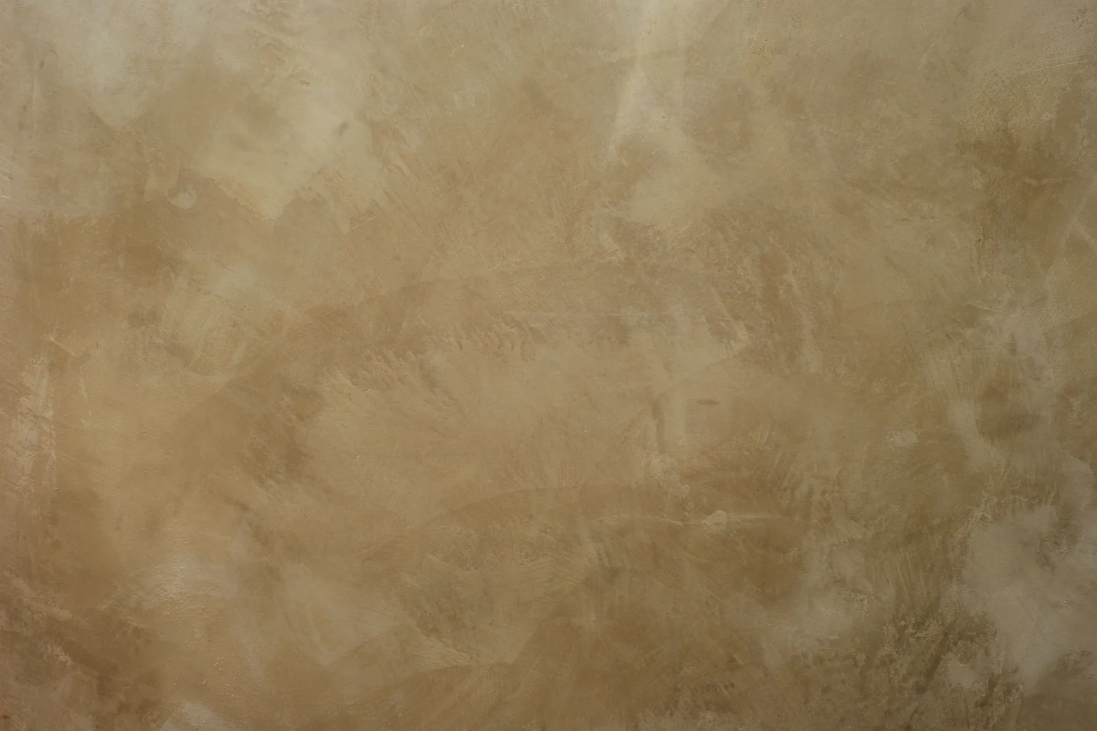 Close-up of a finished Venetian plaster wall in Phoenix, Arizona, showing the polished, marbled texture of a completed installation.
